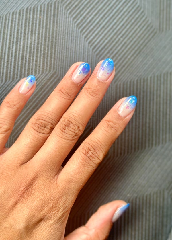 Picture by Ziodynes saying 'Nails Grew Out Long Enough To Be Shaped 💙 Blue Glitter Ombré'