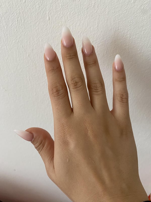 Picture by Confident-Nothing944 saying 'First Time I Got My Nails Done. I Didn’t Think Long Nails Would Be So Hard To Deal With. I Could Not Even Close The Zipper Of My Bag and Jacket😭'