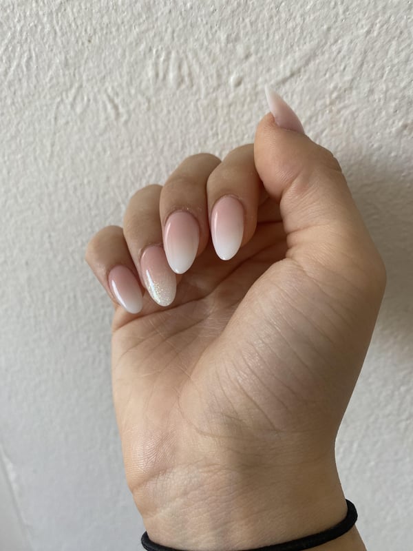 Picture by Confident-Nothing944 showing 'First Time I Got My Nails Done. I Didn’t Think Long Nails Would Be So Hard To Deal With. I Could Not Even Close The Zipper Of My Bag and Jacket😭' number 2