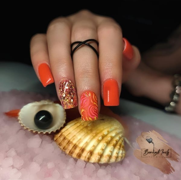 Picture by benigNails saying 'Coral 🪸'