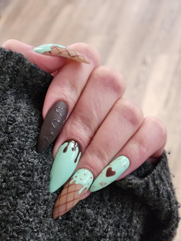 Picture by Mystical_Kit saying 'Summer Ice Cream Themed Nails 🍦'