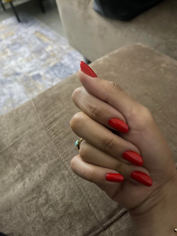 Picture by BreakfastForeign3591 saying 'Kinda Obsessed With My Nails, Boyf Says It's Too Red Hahaha Thoughts? 🤪'