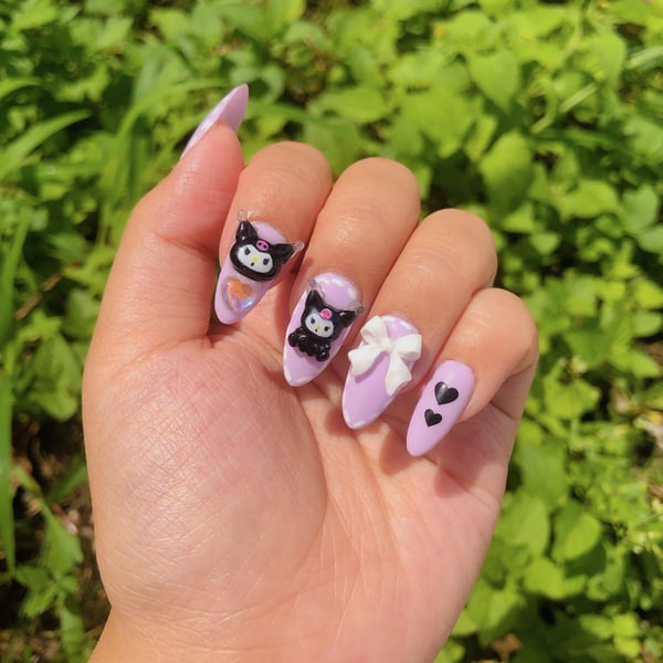 Picture by xXx_Lavender_xXx showing 'Kuromi Nails 💜' number 2