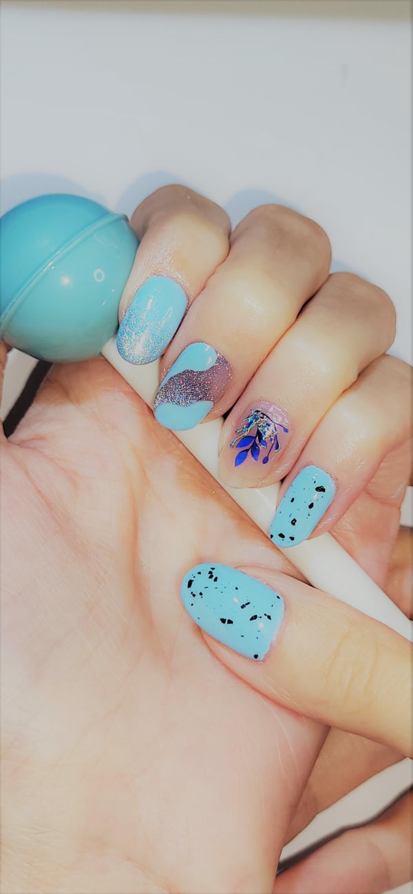 Picture by iieevaa saying 'Simple Gel Nail Art With Cat Eye Gel And Tried Blue Flower Stickers From Shein.com'