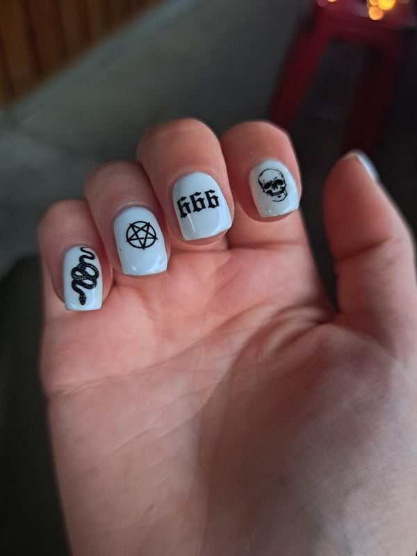 Picture by lexi0917 saying 'Hope This Isn't Offensive But I'm Digging My Occult Nails.'