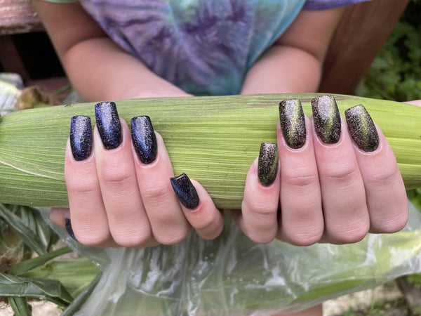 Picture by StrangeMango775 showing 'Did My Sisters Cat Eye Nails, Swipe For Corn Husk Modeling 😂' number 3