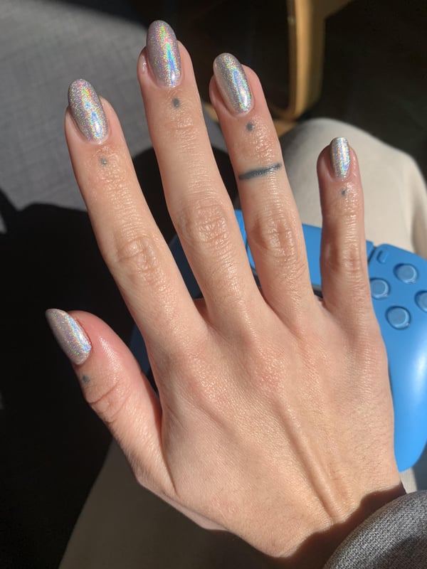 Picture by foreverxshook saying 'Silver Holo Chrome 💿 Had To Wait Nearly A Week For The Sun To Come Out To See These In Action🥲'