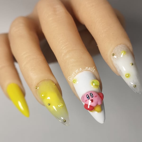 Picture by Justme-33 saying '3d Kirby Nails 💛💕✨'