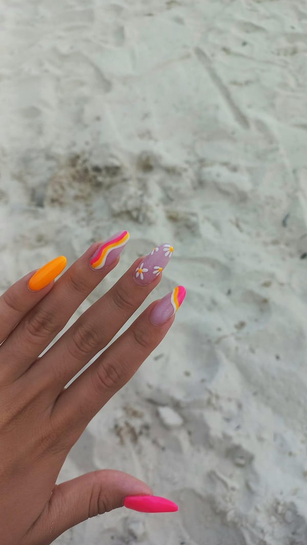 Picture by khereen saying 'My Summer Nails🌼🏝☀️🌊🌊'