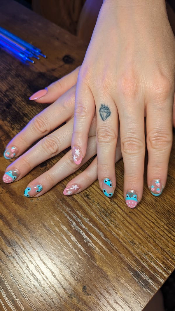 Picture by ghost_anatomy saying 'Strawberry Frog Nails I Did On My Friend'