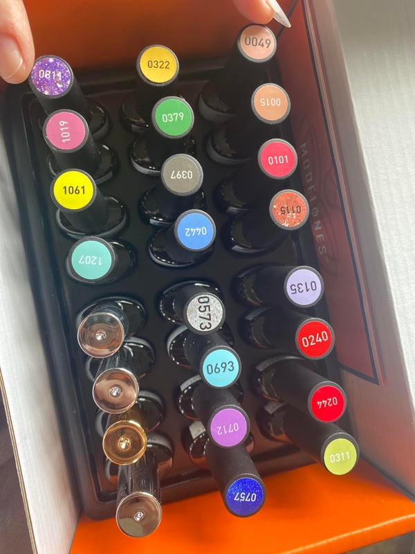 Picture by Suspicious_Flower_98 saying 'My Neighbor Gave Me Her Old Gel Polishes😭🥰'