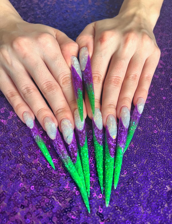 Picture by Fine-Ad2329 saying 'Purple&green Long Nails 💚💜'