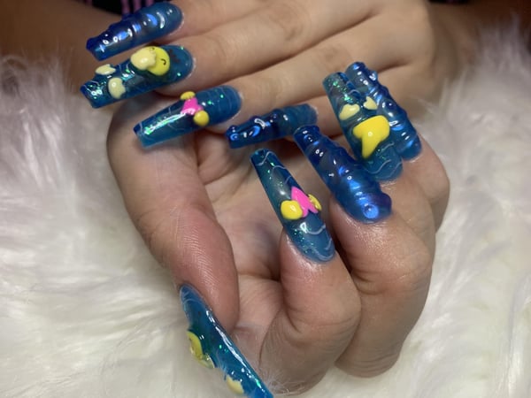 Picture by ChronicallyNailed saying 'Some Press On Psyduck Nails I Made For Myself! :'