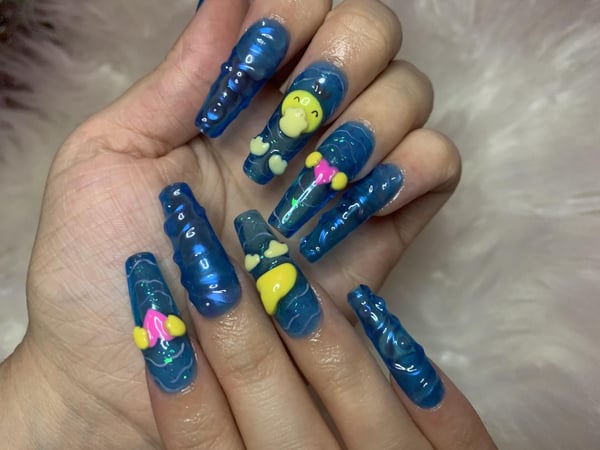 Picture by ChronicallyNailed showing 'Some Press On Psyduck Nails I Made For Myself! :' number 4