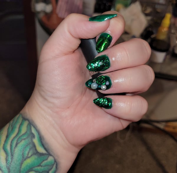 Picture by FeelingResolution382 saying 'I Bought A New Car, So To Save Money, I've Been Learning To Do My Nails. I Call This One Dripping With Emeralds'