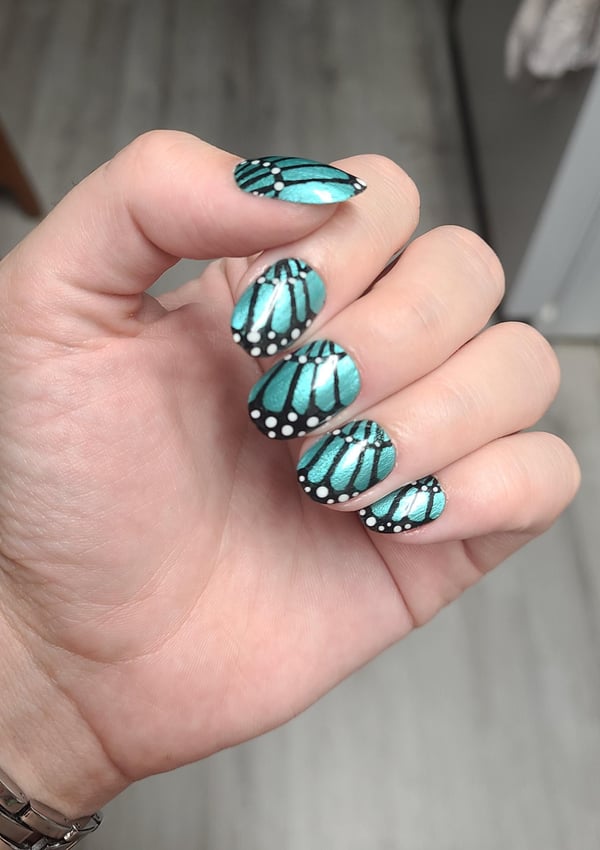 Picture by chillin_and_livin saying 'Butterfly Nails'