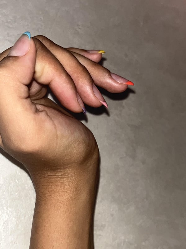 Picture by souishere saying 'I Tried To Do These Rainbow French Tips With Gel Polish On Myself, They’re A Little Wonky But I’m Super Proud Of Myself!!'