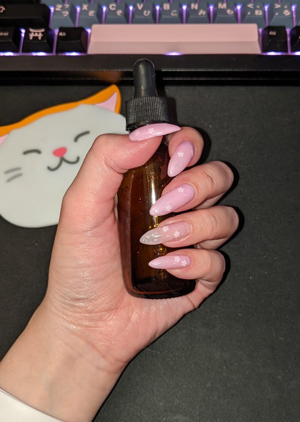 Picture by ipoopette saying 'Gel Polish With Flower Flakes! Couldn't Resist It 🌸'