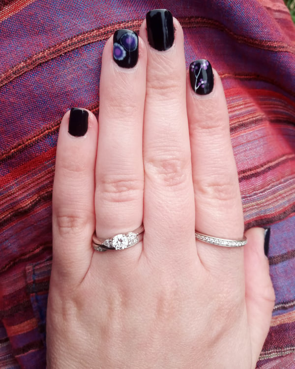 Picture by Dodder1992 saying 'Cute Purple Flowers And Marbling On Black Natural Nails 💅 🖤'