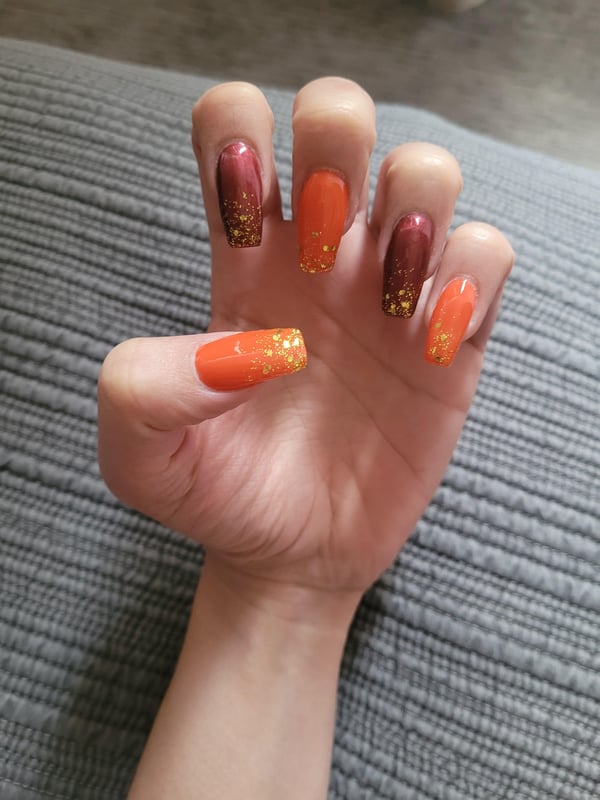 Picture by Ok-GetitBish-9653 showing 'Sparkly Fall Nails 🎃' number 2