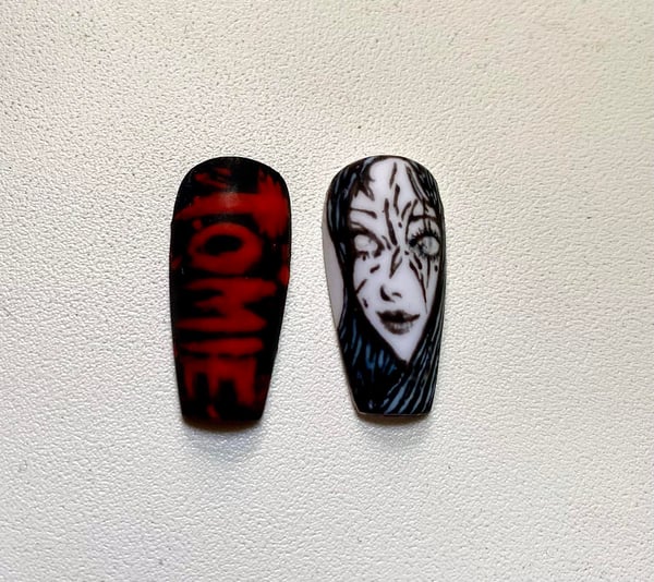 Picture by Nisshiou saying 'I Tried To Make Junji Ito's Tomie Nails, Made Two Of Them But Not Satisfied With How It Come Up. Should I Make More Or Not?'