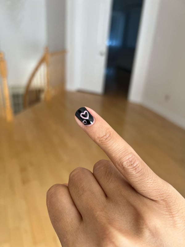 Picture by Unwrittense saying 'Did One Nail To Practice For My Exam, First Time What Do You Think?'