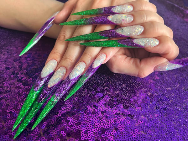 Picture by Fine-Ad2329 saying 'My Long Nails 💚💜'