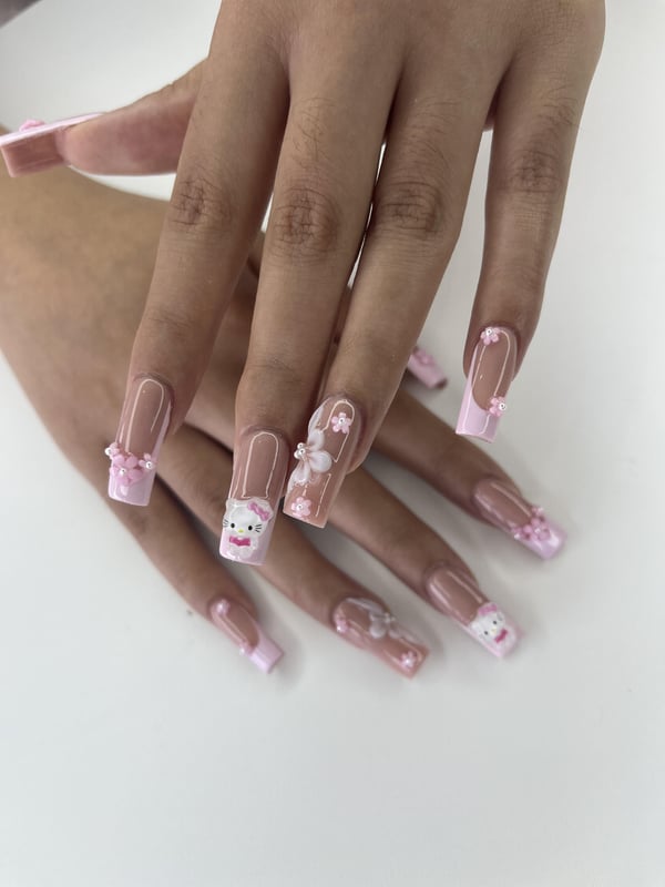 Picture by booticheek saying 'Hello Kitty Nails!'