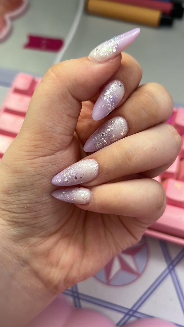 Picture by sug4sug4 saying 'Obsessed With My New Nails! I Let My Nail Tech Do Whatever He Wanted To Do, Only Giving Him The Info That I Loved Purple And Ugh, I Can’t Stop Looking At Them!'