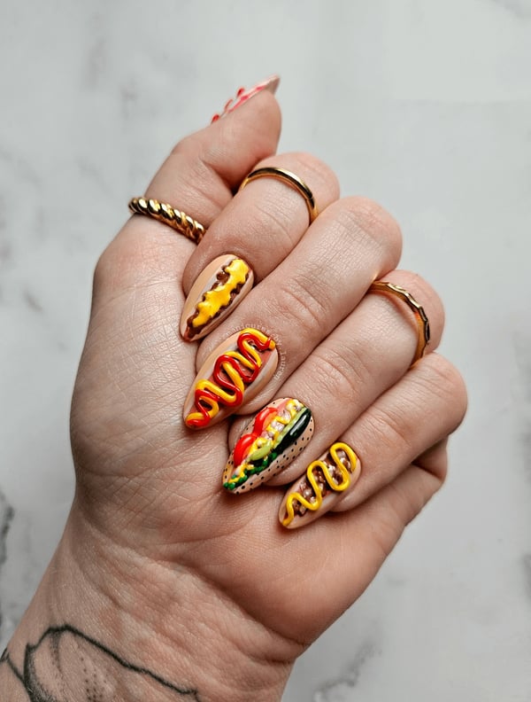 Picture by laurizzle22 saying 'Hand Sculpted Hotdog Nails 🌭✨️'