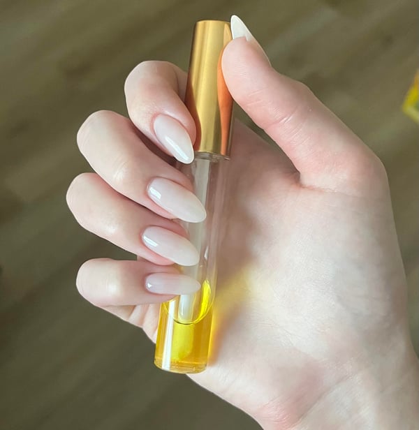 Picture by feverdreamremedy saying 'A Genius User On The SCA Sub Shared That They Used Old Makeup Containers For Cuticle Oil So Ofc I Ran To Purchase Some Empty Lipgloss Tubes And…wow 10/10. The Little Wand Applicator Is Perfect For Applying Just The Right Amount Of Oil!'