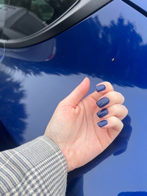 Picture by 2ndgentarot saying 'Accidentally Matched My Nails To My Car'